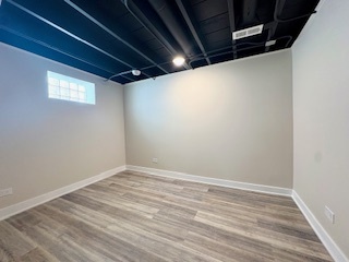10353 South Spaulding Avenue Chicago, IL 60655 - Photo 15 of 21 a view of room with wooden floor