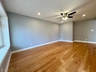 10353 South Spaulding Avenue Chicago, IL 60655 - Photo 4 of 21 a view of empty room with wooden floor