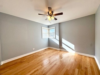 10353 South Spaulding Avenue Chicago, IL 60655 - Photo 6 of 21 a view of an empty room and window
