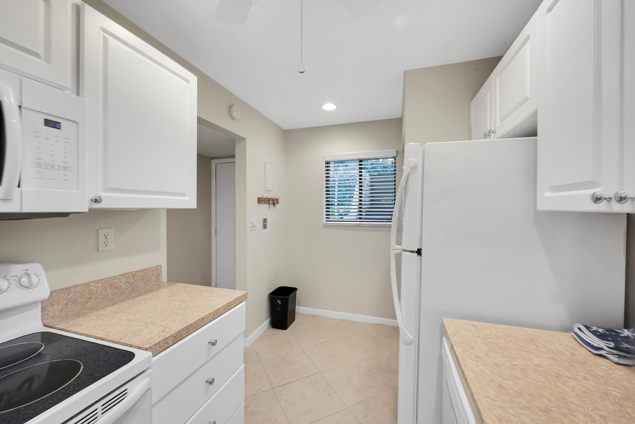 5313 Southeast Miles Grant Road, Unit 111 Stuart, FL 34997 - Photo 4 of 24 4FC428E3-6B92-4CB6-9782-9FEF150B5E26
