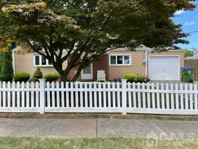 10 Colton Road Edison, NJ 08817 - Photo 1 of 17 a white house that has tree in front of it