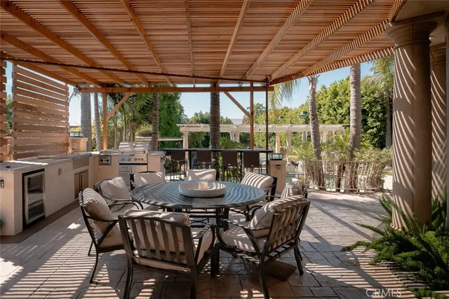 a dining room with furniture window and outside view