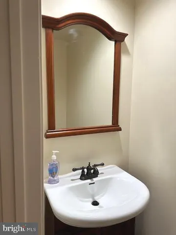 a bathroom with a sink and a toilet