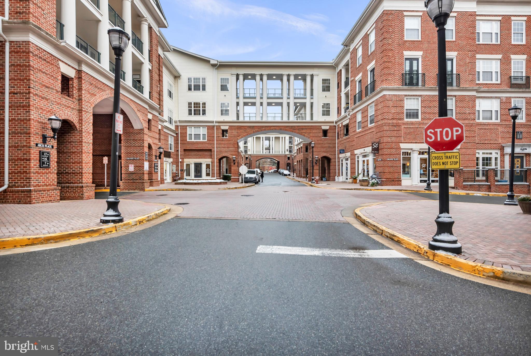 7 Booth Street, Unit 302 Gaithersburg, MD 20878 - Photo 1 of 63 a view of a street with buildings
