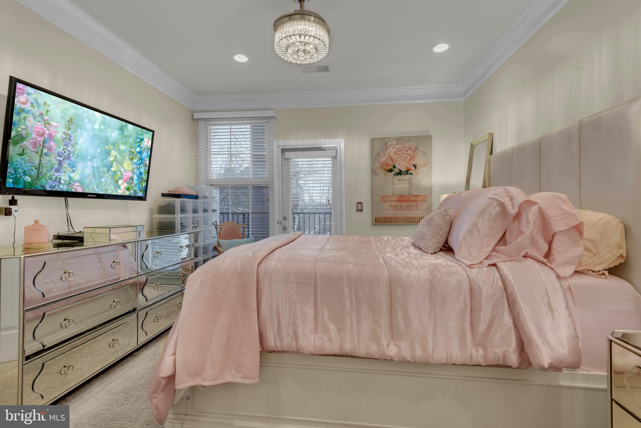 7 Booth Street, Unit 302 Gaithersburg, MD 20878 - Photo 21 of 63 a bedroom with a bed and a flat screen tv