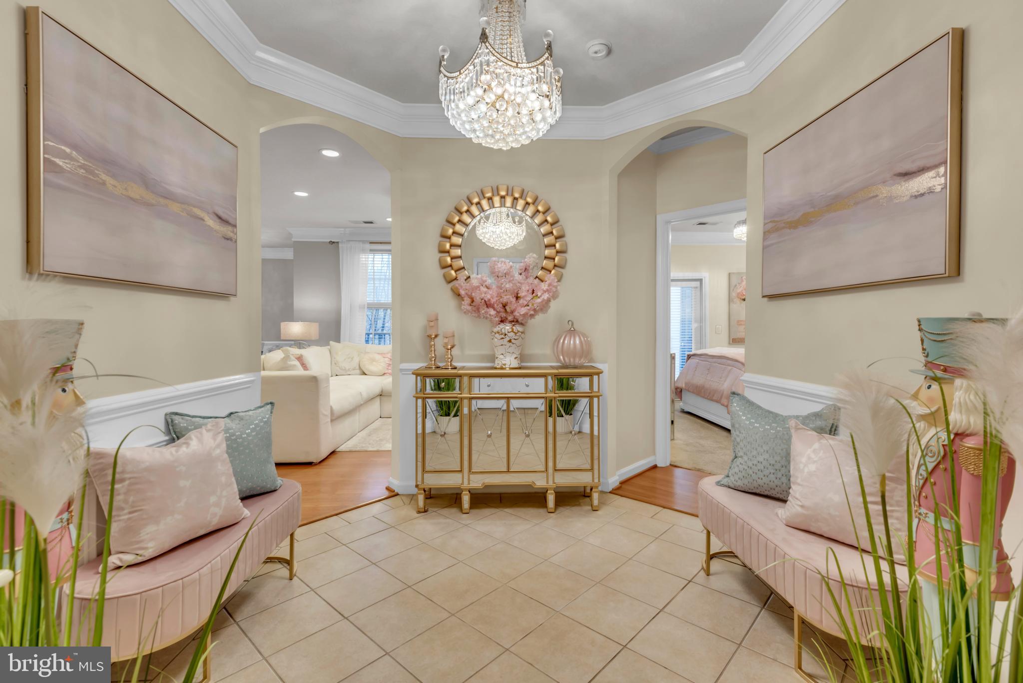 7 Booth Street, Unit 302 Gaithersburg, MD 20878 - Photo 5 of 63 a living room with furniture a table and decor