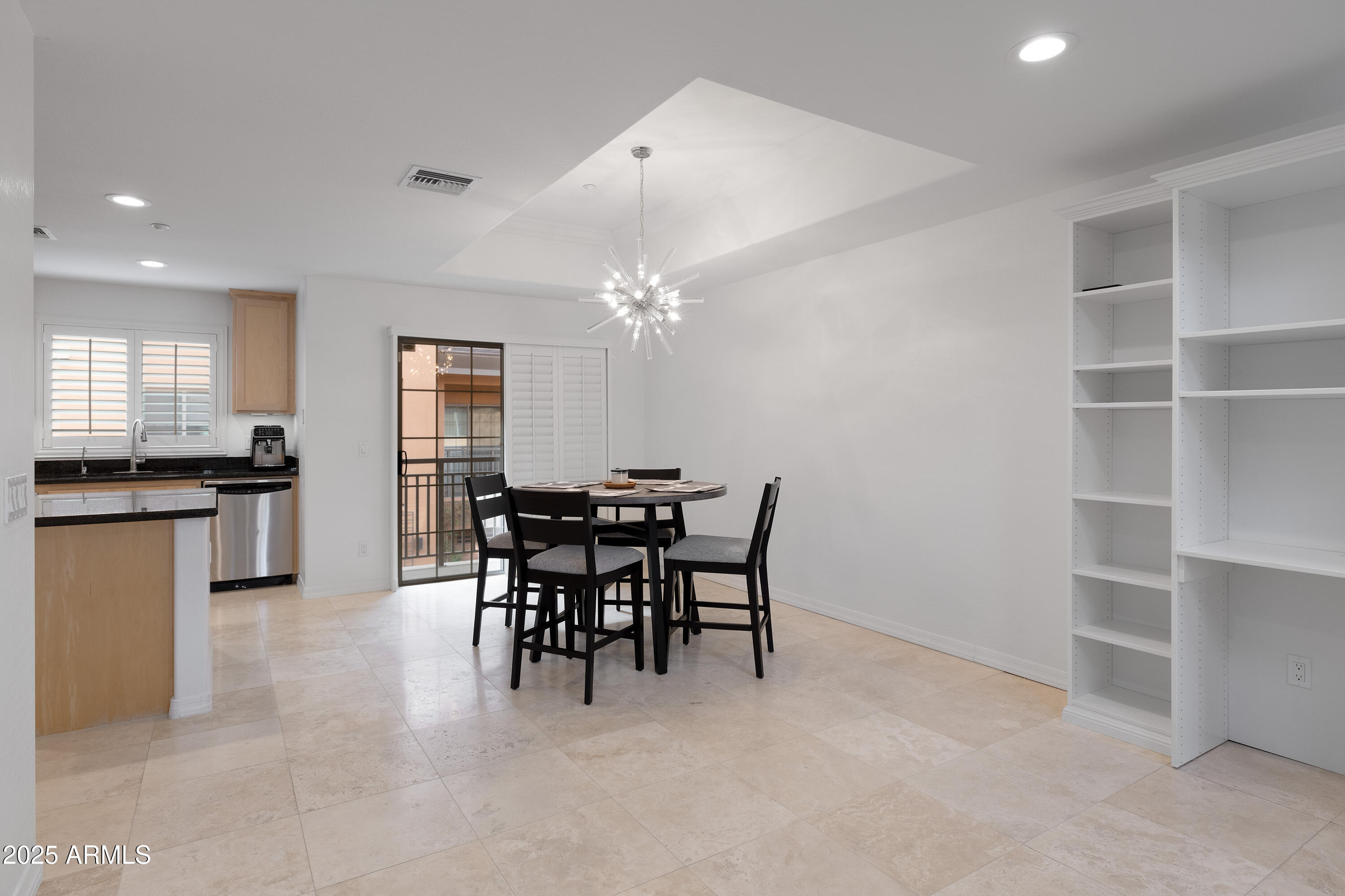 6940 East Cochise Road, Unit 1011 Paradise Valley, AZ 85253 - Photo 14 of 33 Dining and Custom Book Shelves