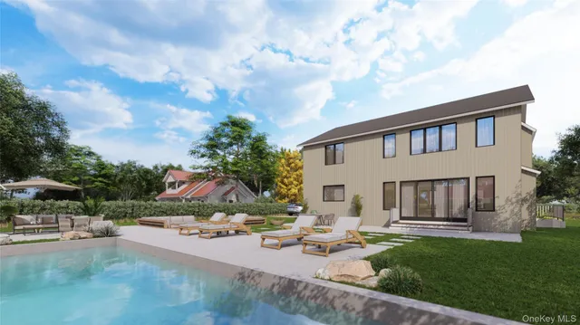 a view of a house with backyard and sitting area