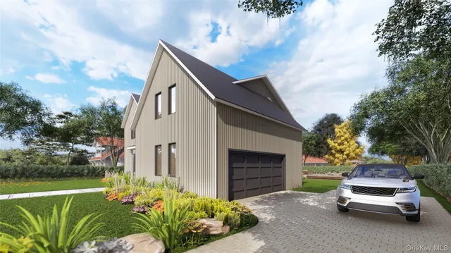 a car parked in front of a house with yard