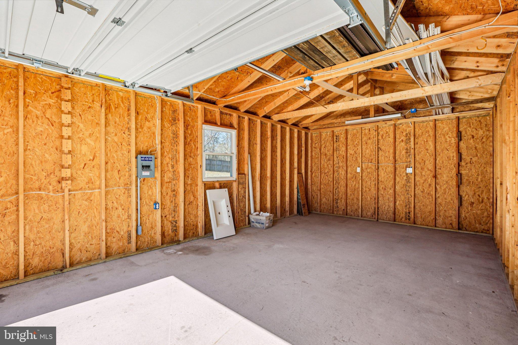 306 Christy Road Pasadena, MD 21122 - Photo 28 of 58 Spacious garage ready for your projects.