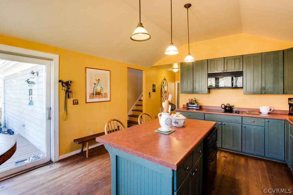 12016 Old Buckingham Road Midlothian, VA 23113 - Photo 15 of 24 a kitchen with a sink cabinets and wooden floor
