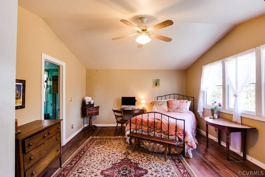 12016 Old Buckingham Road Midlothian, VA 23113 - Photo 18 of 24 a bedroom with a bed and wooden floor