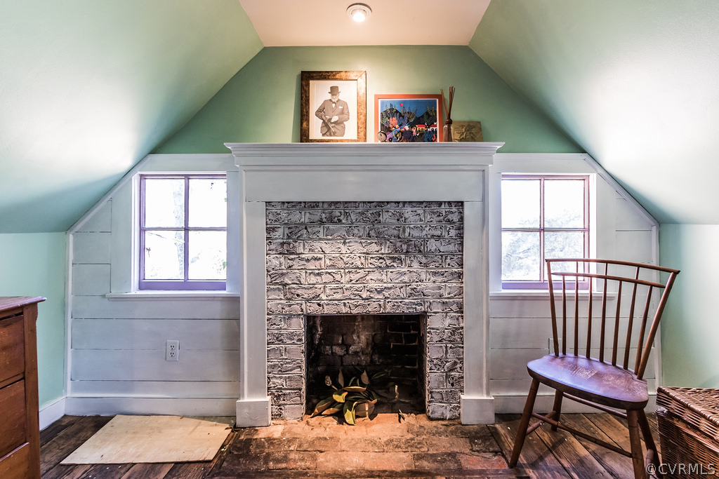 12016 Old Buckingham Road Midlothian, VA 23113 - Photo 22 of 24 a living room with furniture and a fireplace