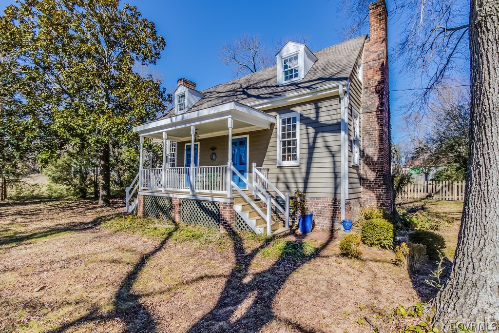 12016 Old Buckingham Road Midlothian, VA 23113 - Photo 3 of 24 front view of a house with a yard