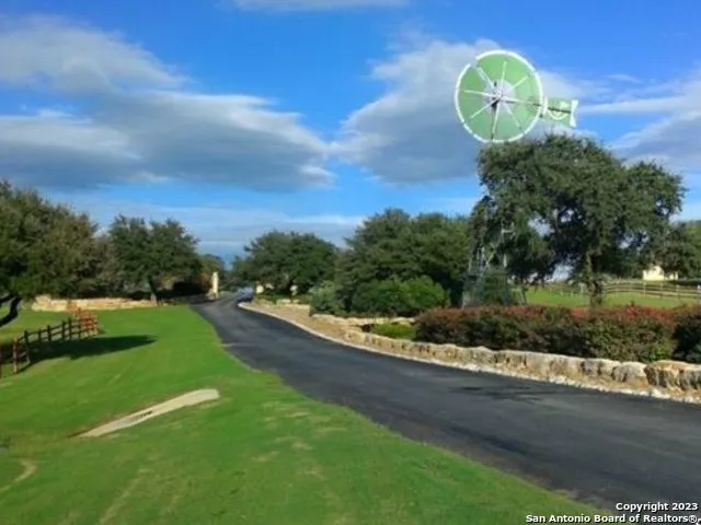 a view of a table and chairs in the yard