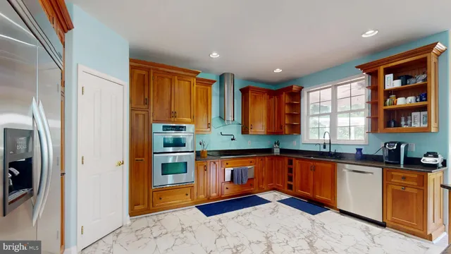 a view of a livingroom with a hall and wooden floor