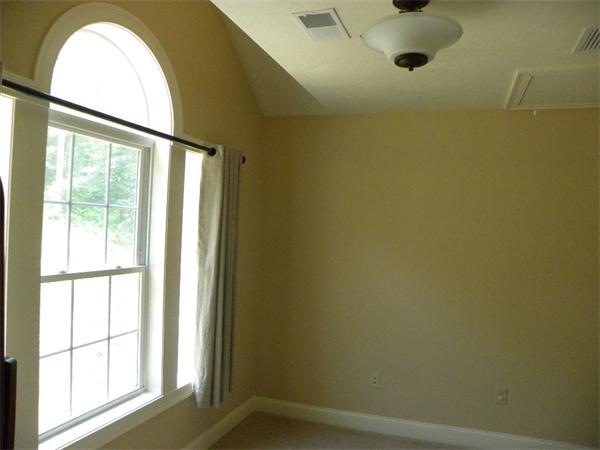 52 Baker Pond Road Charlton, MA 01507 - Photo 17 of 30 a view of a bathroom with a window