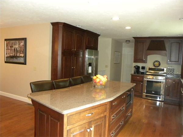52 Baker Pond Road Charlton, MA 01507 - Photo 18 of 30 a kitchen with granite countertop a sink cabinets and stainless steel appliances