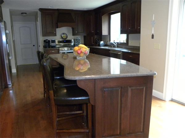 52 Baker Pond Road Charlton, MA 01507 - Photo 19 of 30 a kitchen with a sink a stove and cabinets