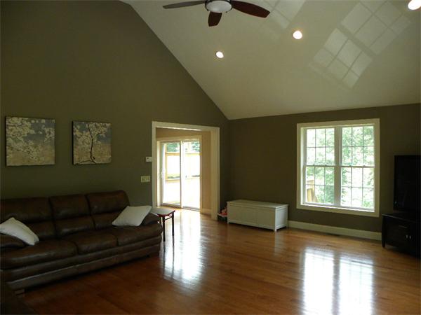 52 Baker Pond Road Charlton, MA 01507 - Photo 20 of 30 a living room with furniture and a window