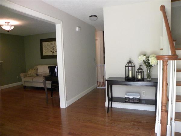 52 Baker Pond Road Charlton, MA 01507 - Photo 26 of 30 a living room with furniture and a table