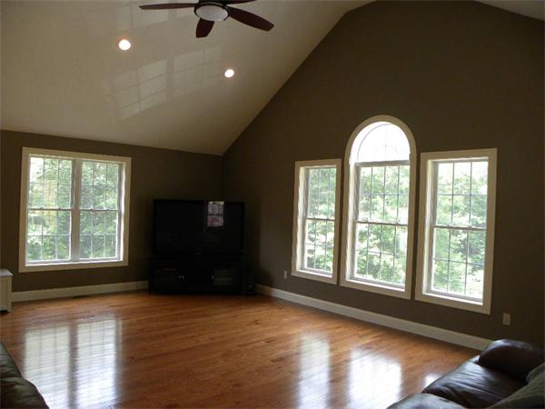 52 Baker Pond Road Charlton, MA 01507 - Photo 3 of 30 a view of empty room with a window and wooden floor
