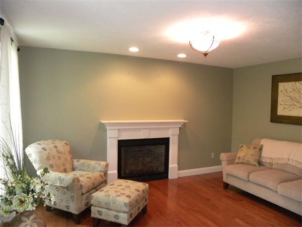 52 Baker Pond Road Charlton, MA 01507 - Photo 7 of 30 a living room with furniture and a fireplace