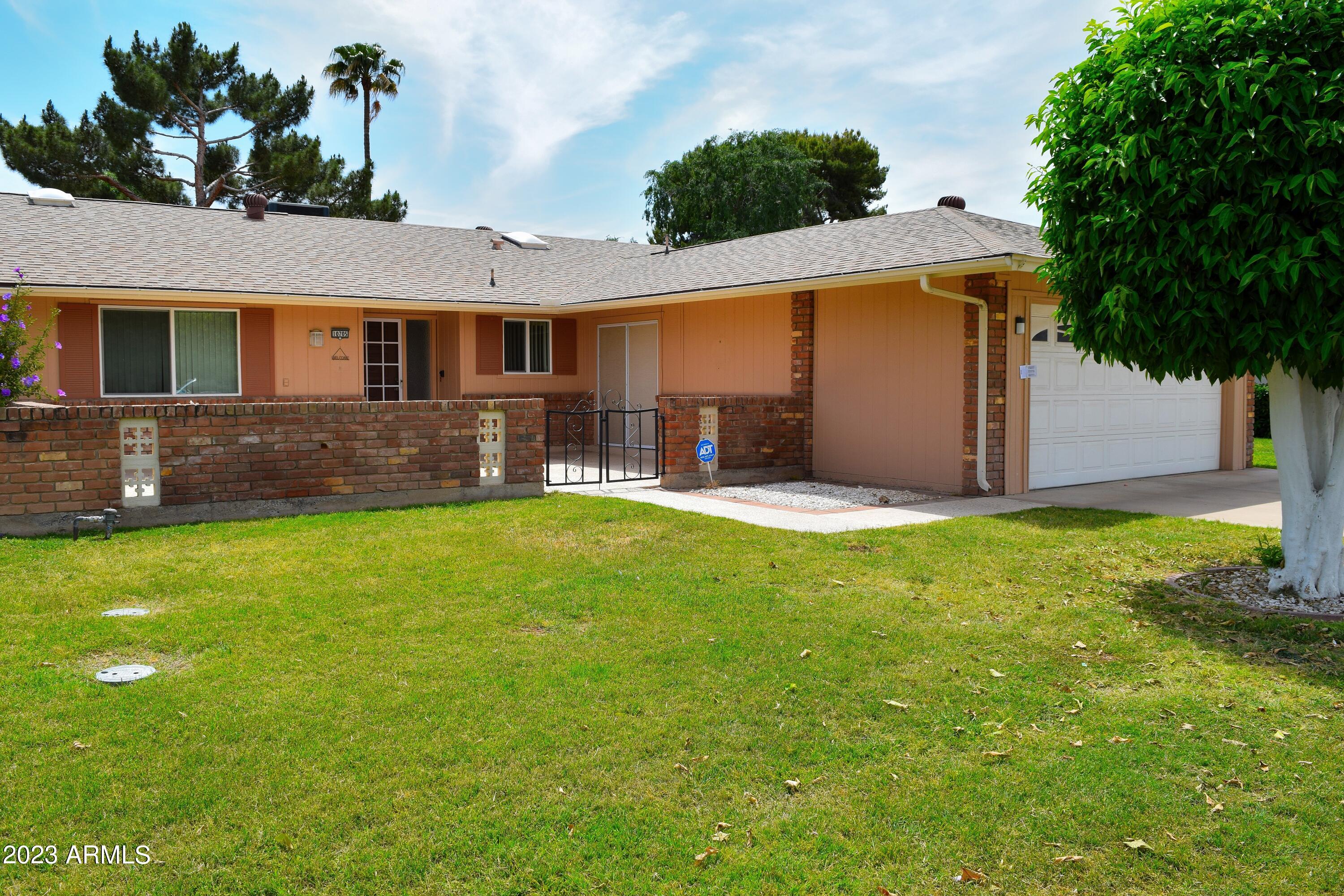 10705 West Hatcher Road Sun City, AZ 85351 - Photo 1 of 29 10705 W Hatcher Rd