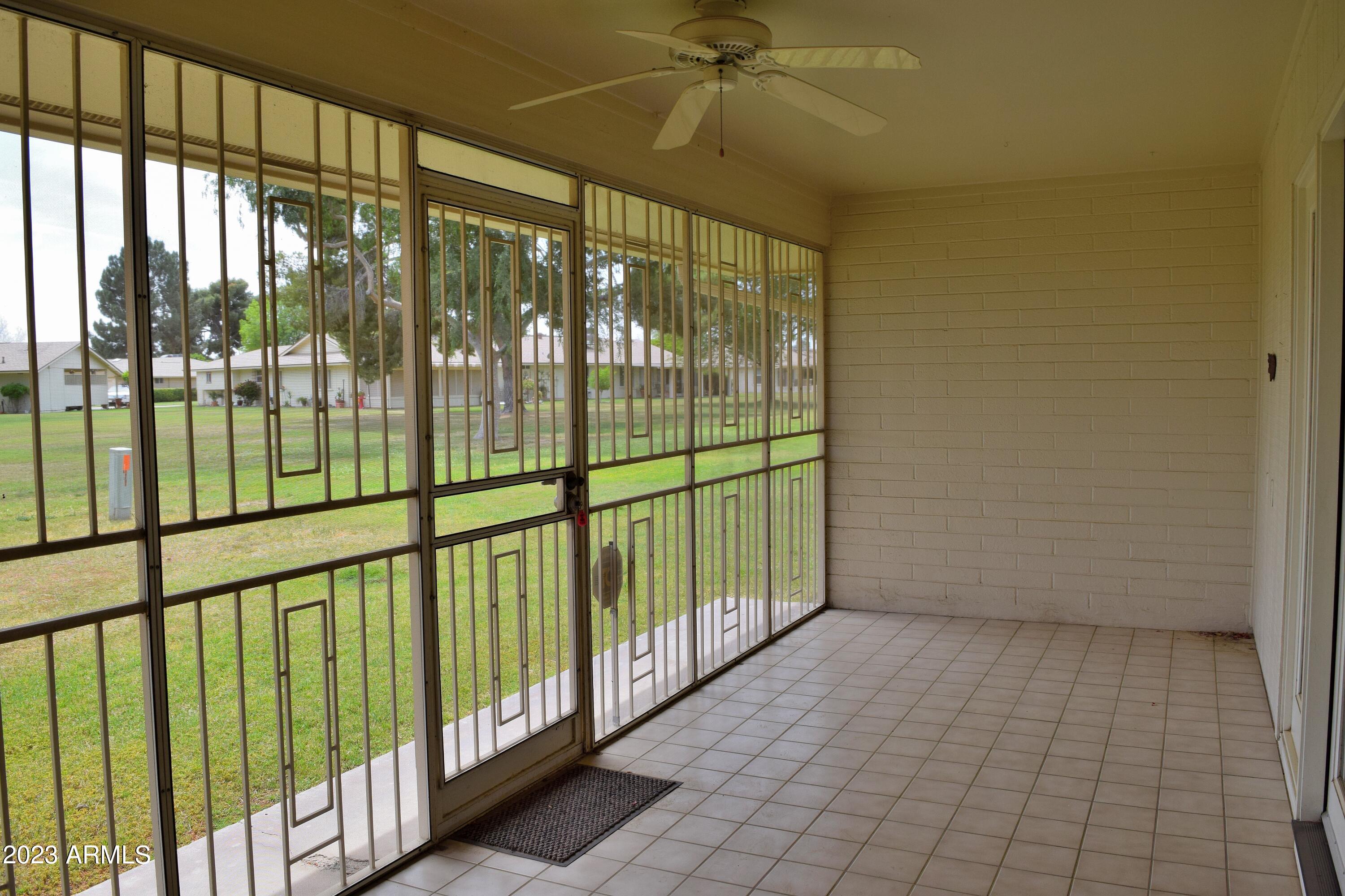 10705 West Hatcher Road Sun City, AZ 85351 - Photo 18 of 29 Screened in Back Patio