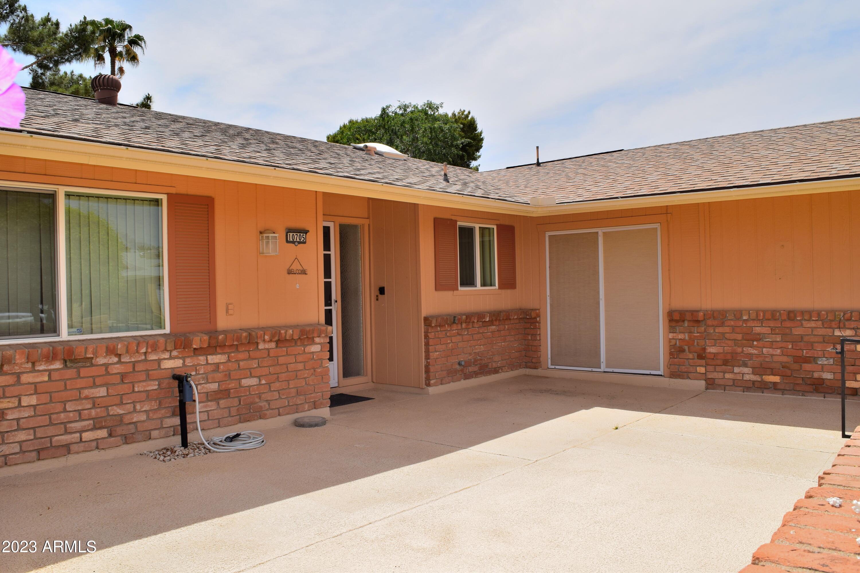 10705 West Hatcher Road Sun City, AZ 85351 - Photo 2 of 29 Private Front Courtyard