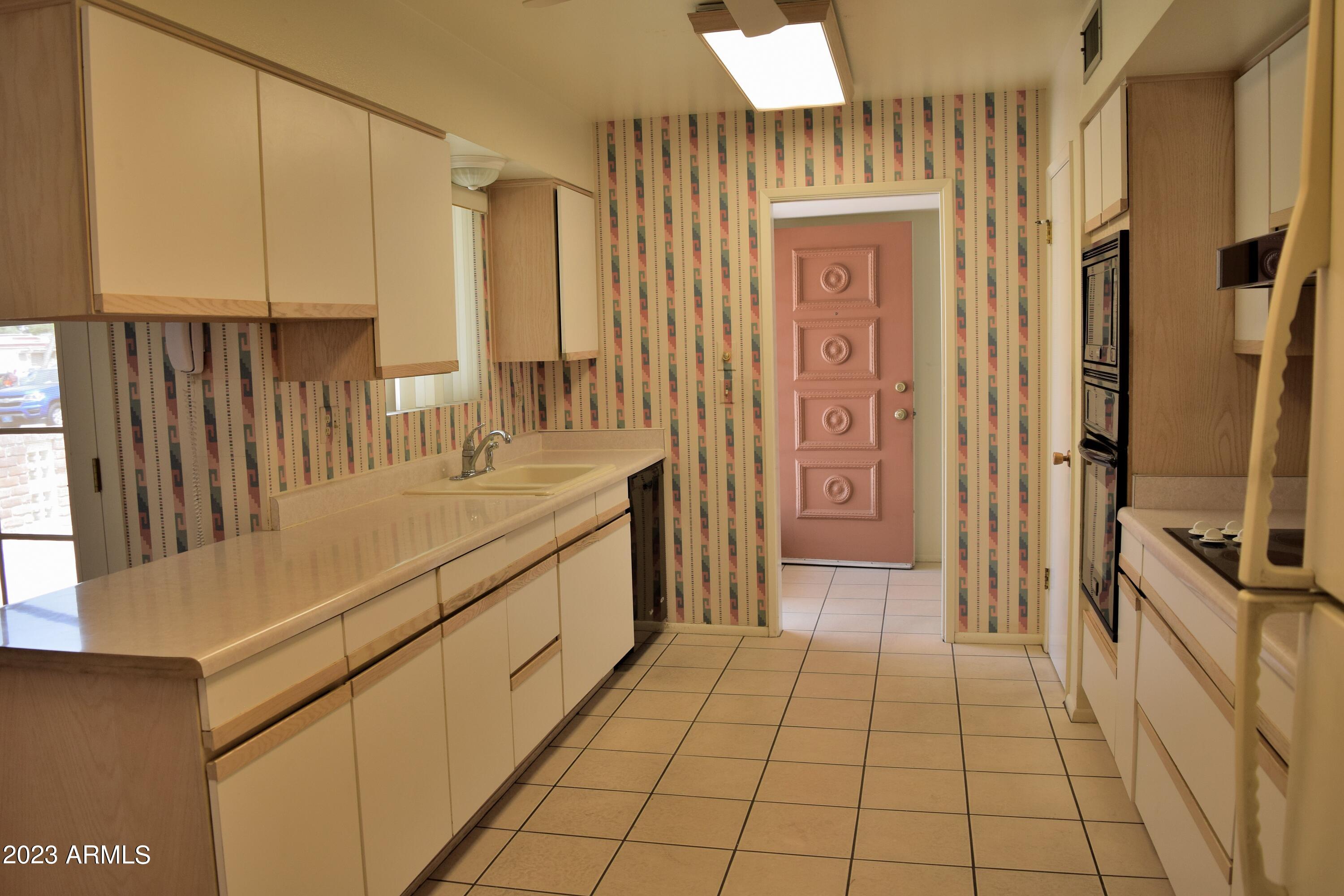 10705 West Hatcher Road Sun City, AZ 85351 - Photo 5 of 29 Kitchen