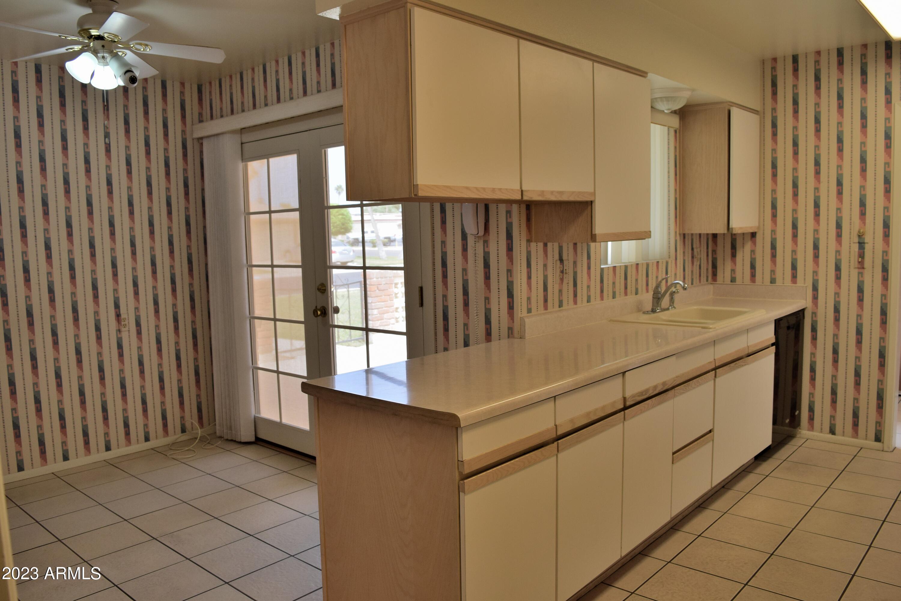 10705 West Hatcher Road Sun City, AZ 85351 - Photo 6 of 29 Kitchen