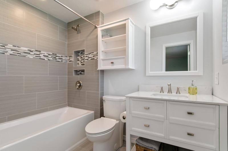 347 Lobelia Road St. Augustine, FL 32086 - Photo 16 of 40 a bathroom with a sink a toilet and a bathtub