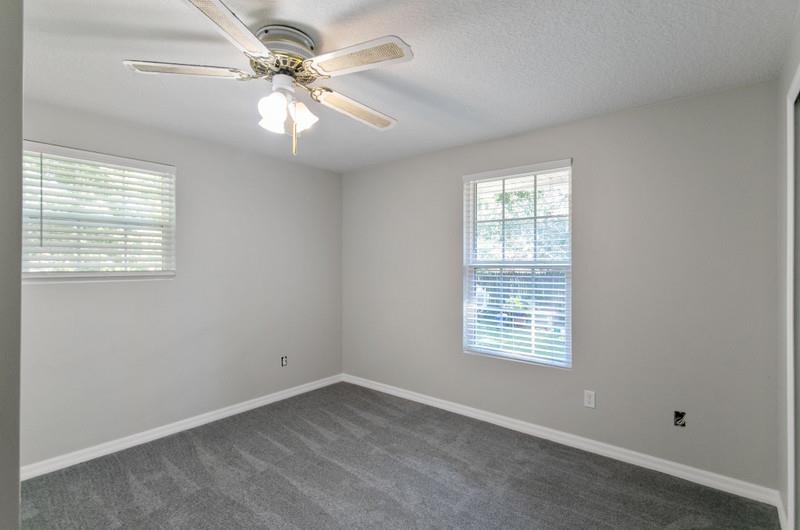 347 Lobelia Road St. Augustine, FL 32086 - Photo 18 of 40 a view of an empty room with a window