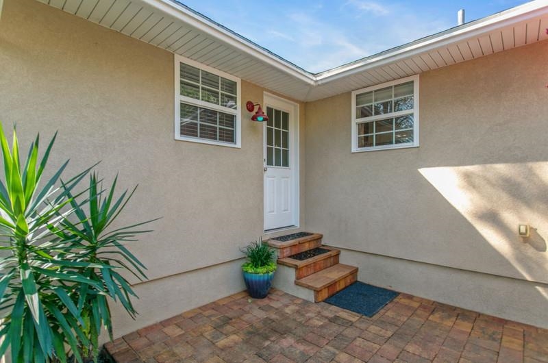 347 Lobelia Road St. Augustine, FL 32086 - Photo 27 of 40 a front view of a house with a yard
