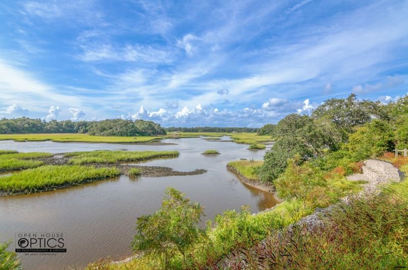 347 Lobelia Road St. Augustine, FL 32086 - Photo 35 of 40 a view of a lake with a big yard