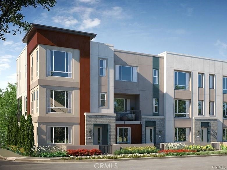 115 Citysquare Irvine, CA 92614 - Photo 1 of 30 a front view of a multi story residential apartment building