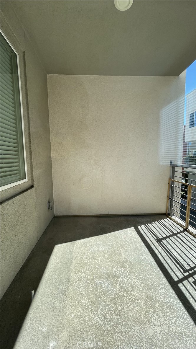 115 Citysquare Irvine, CA 92614 - Photo 21 of 30 a view of a room with a bed