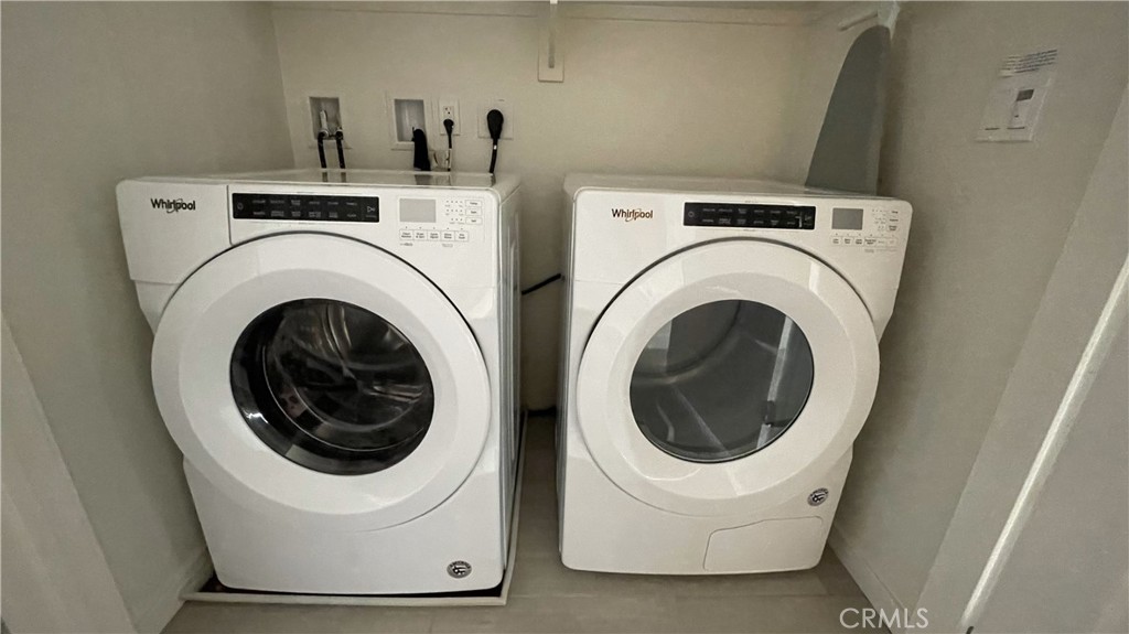 115 Citysquare Irvine, CA 92614 - Photo 22 of 30 a utility room with dryer and washer