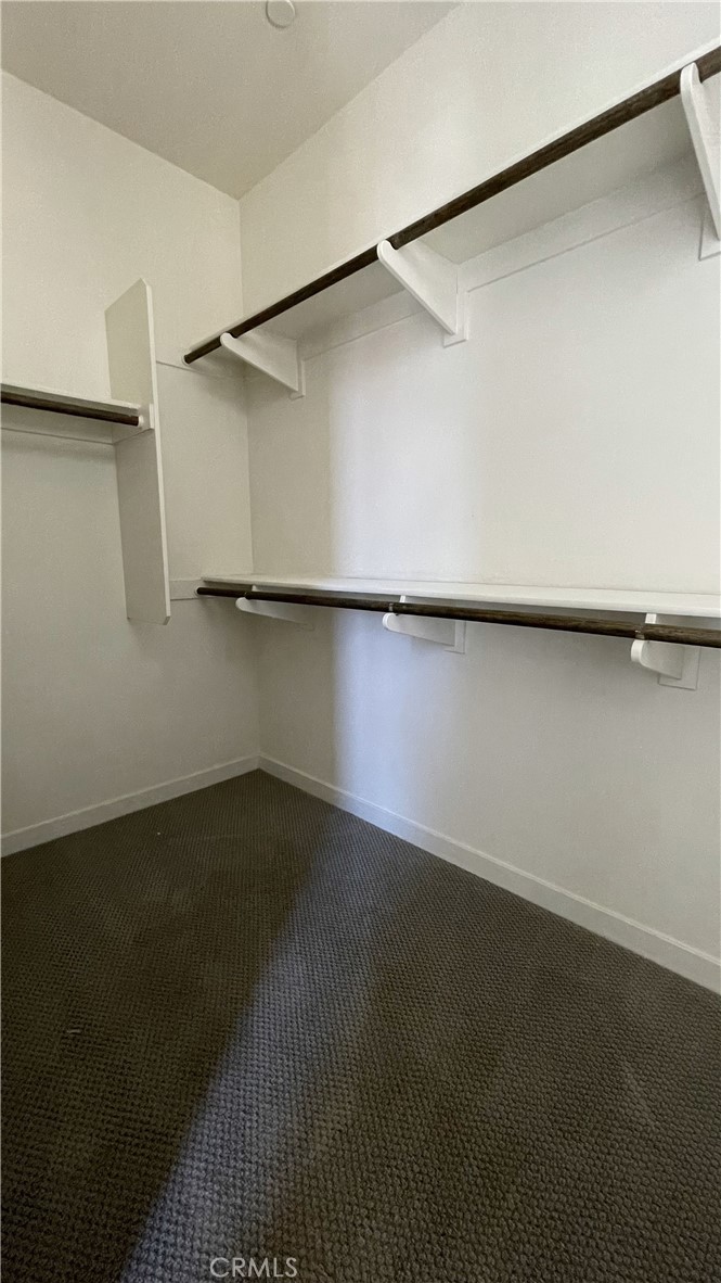 115 Citysquare Irvine, CA 92614 - Photo 24 of 30 an empty room with a wooden floor and a window