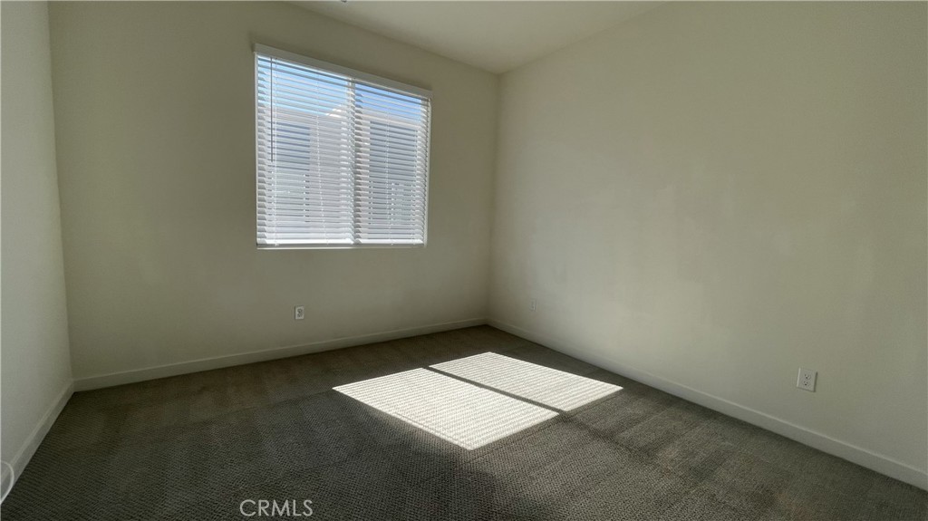 115 Citysquare Irvine, CA 92614 - Photo 25 of 30 an empty room with a window