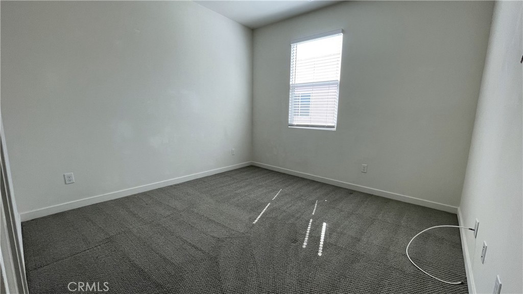 115 Citysquare Irvine, CA 92614 - Photo 27 of 30 a view of an empty room with a window