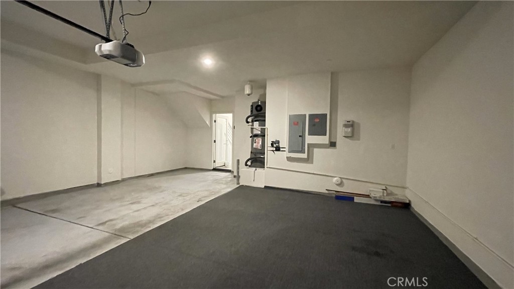 115 Citysquare Irvine, CA 92614 - Photo 29 of 30 a view of a livingroom with a ceiling fan and window
