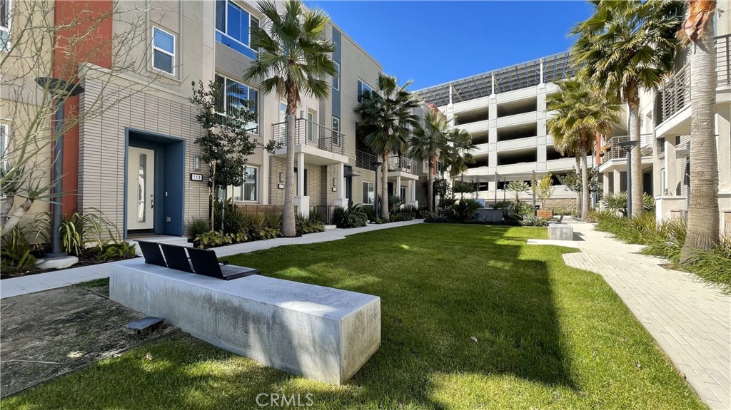 115 Citysquare Irvine, CA 92614 - Photo 3 of 30 a view of a building with a yard