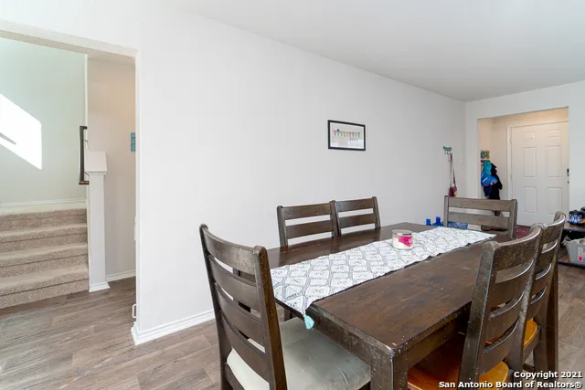 a view of a dining room with furniture