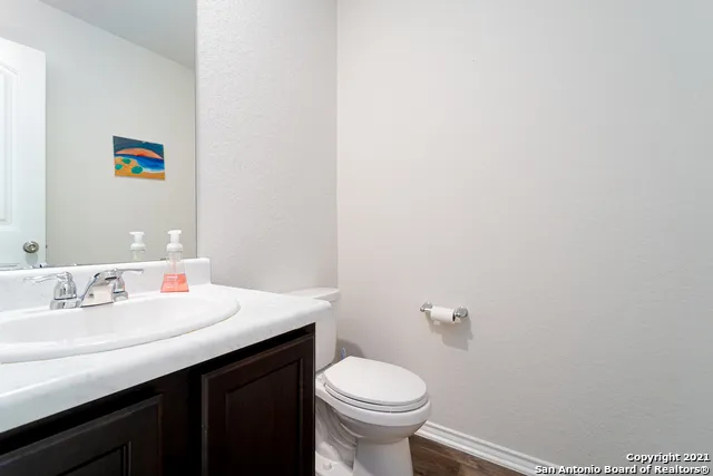 a bathroom with a sink and a toilet