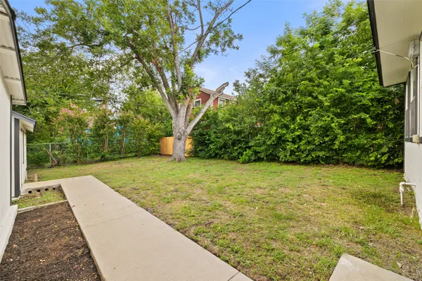 a view of a yard with an outdoor space