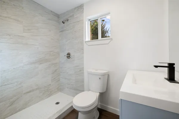 a bathroom with a sink and a toilet