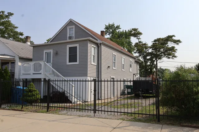 a front view of a house with a porch