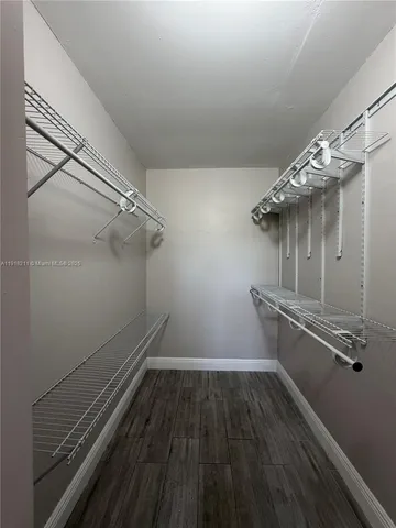 a view of a room with rack on the wall